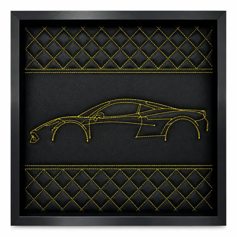 Framed black leather wall art with yellow stitching